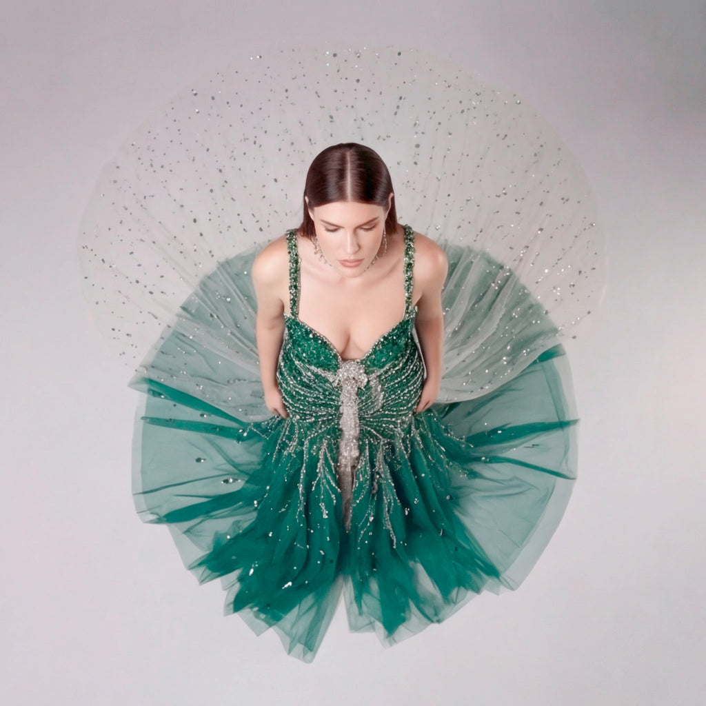Emerald Green Crystal Embellished Deep V-Neck Mermaid Gown with Architectural Waist Detail and High Slit