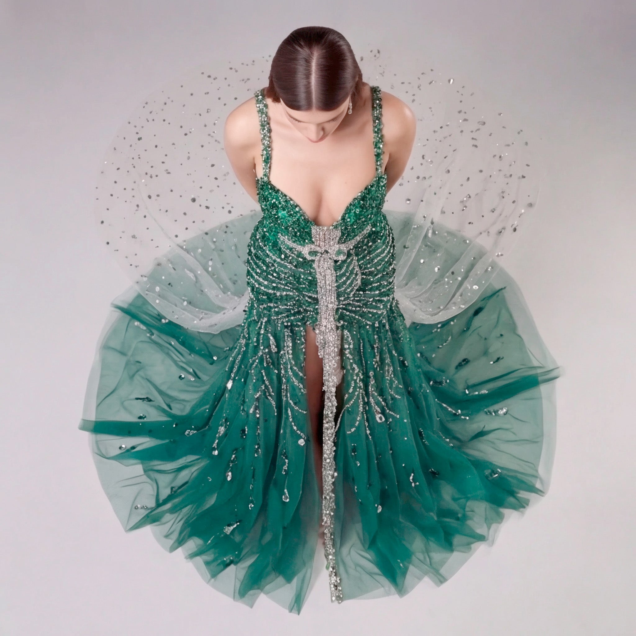 Emerald Green Crystal Embellished Deep V-Neck Mermaid Gown with Architectural Waist Detail and High Slit