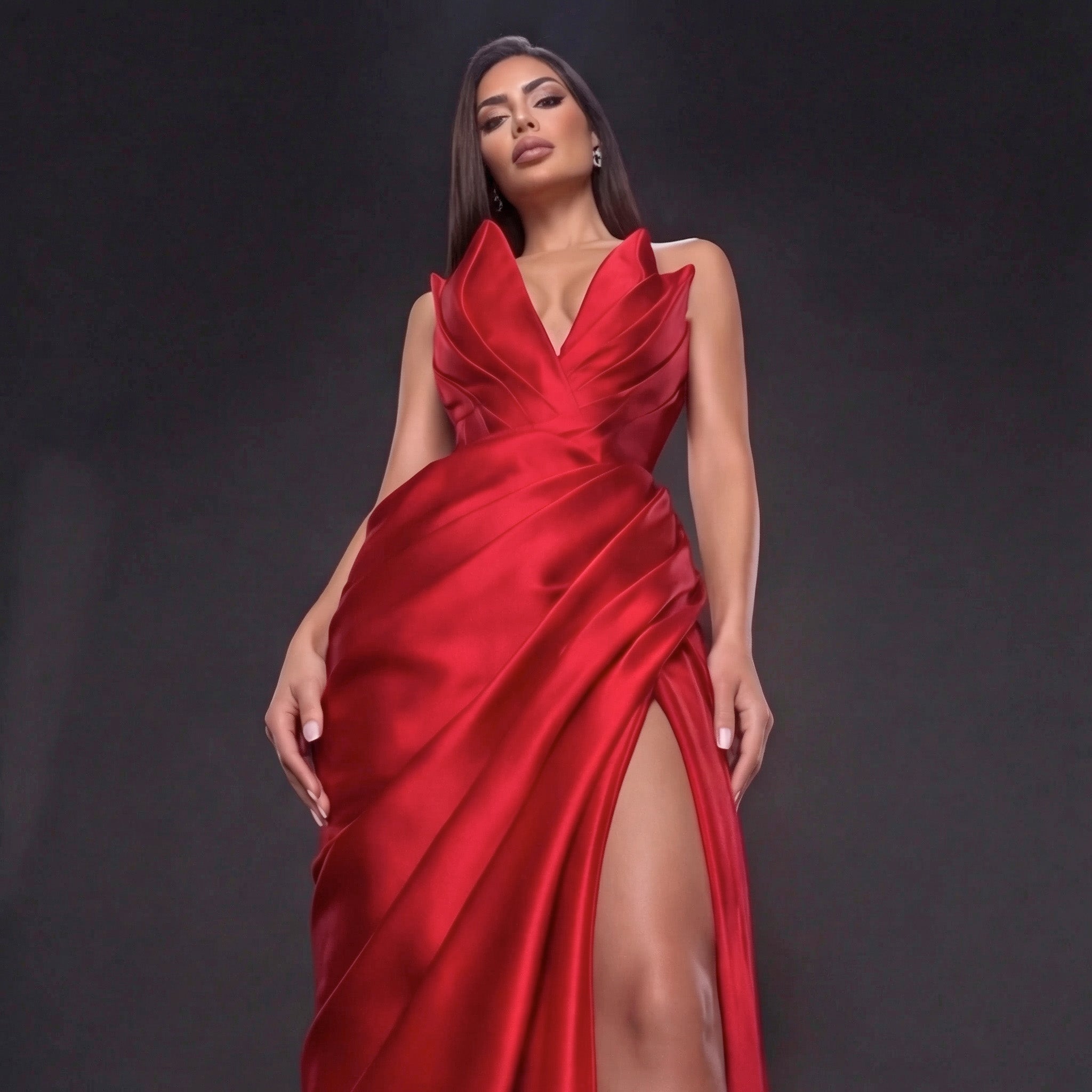 Red Satin Strapless Gown with Sculpted Deep V Neckline, Draped Waist, High Slit and Elegant Column Silhouette