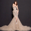Champagne Crystal Embellished Architectural Peplum Strapless Mermaid Gown with High Slit - The Stellarine Monolith