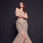 Champagne Crystal Embellished Architectural Peplum Strapless Mermaid Gown with High Slit - The Stellarine Monolith
