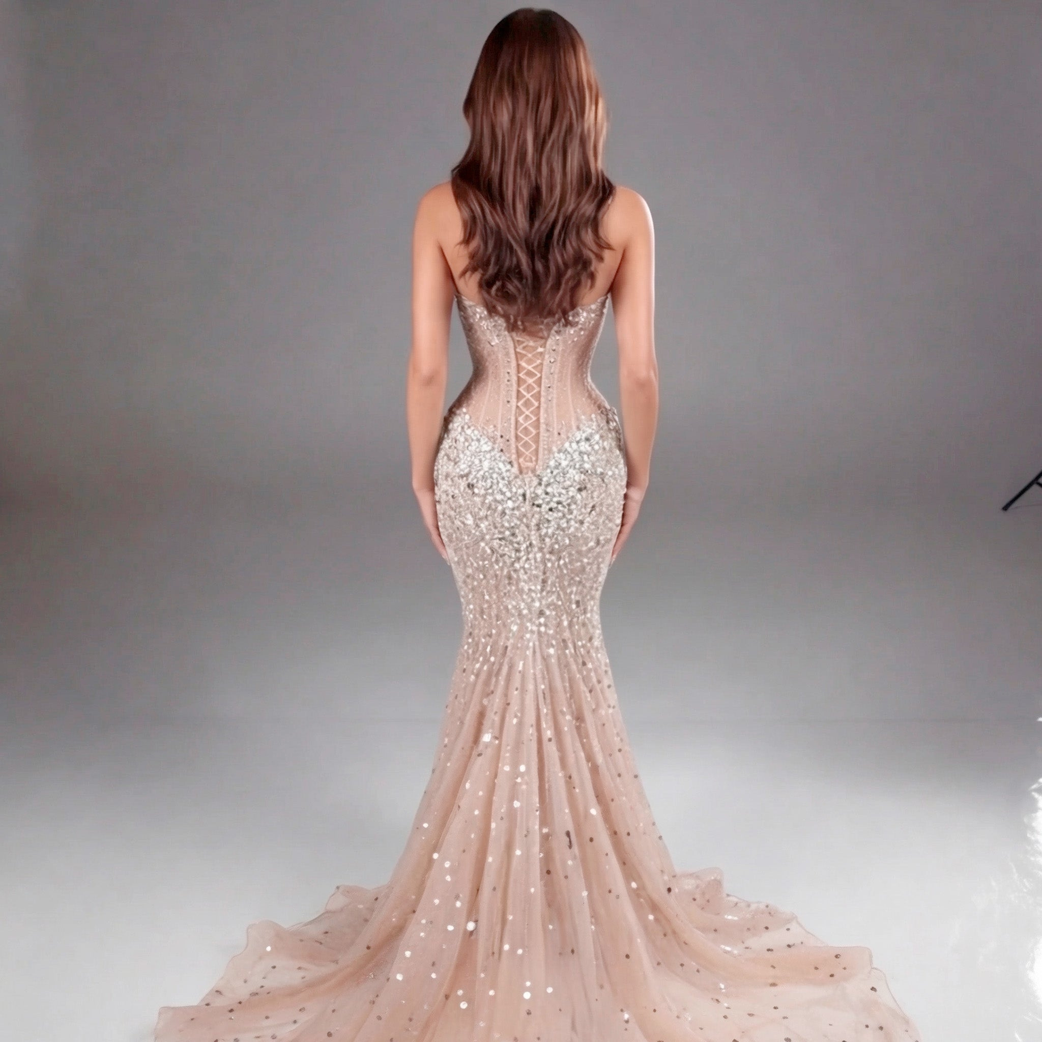 Champagne Crystal Embellished Architectural Peplum Strapless Mermaid Gown with High Slit