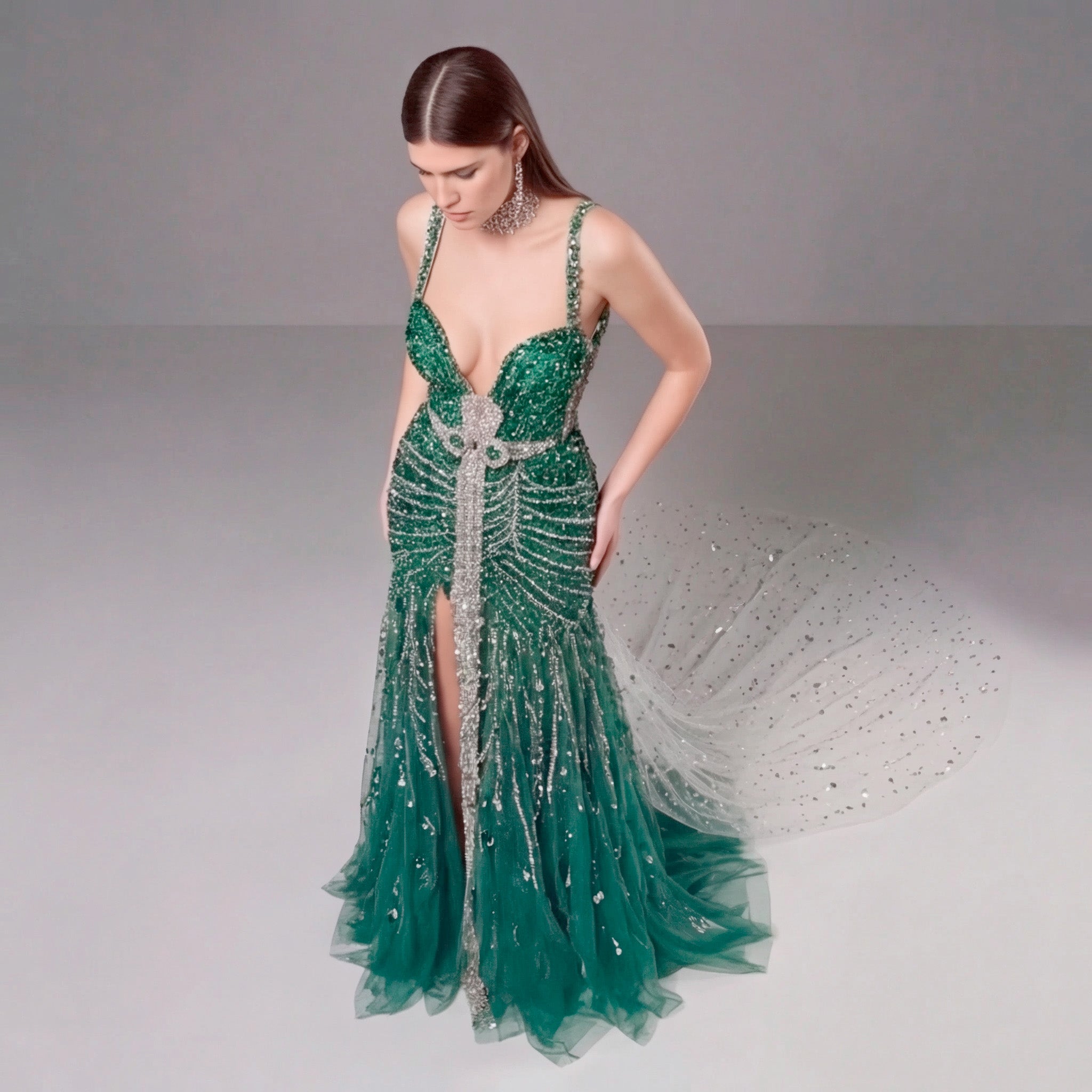 Emerald Green Crystal Embellished Deep V-Neck Mermaid Gown with Architectural Waist Detail and High Slit