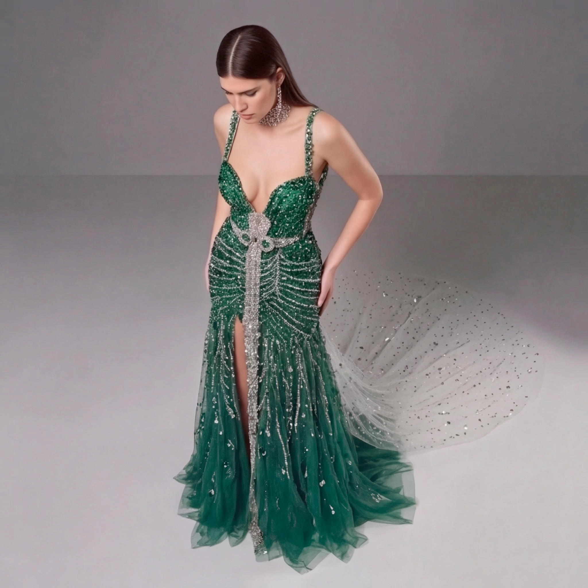Emerald Green Crystal Embellished Deep V-Neck Mermaid Gown with Architectural Waist Detail and High Slit