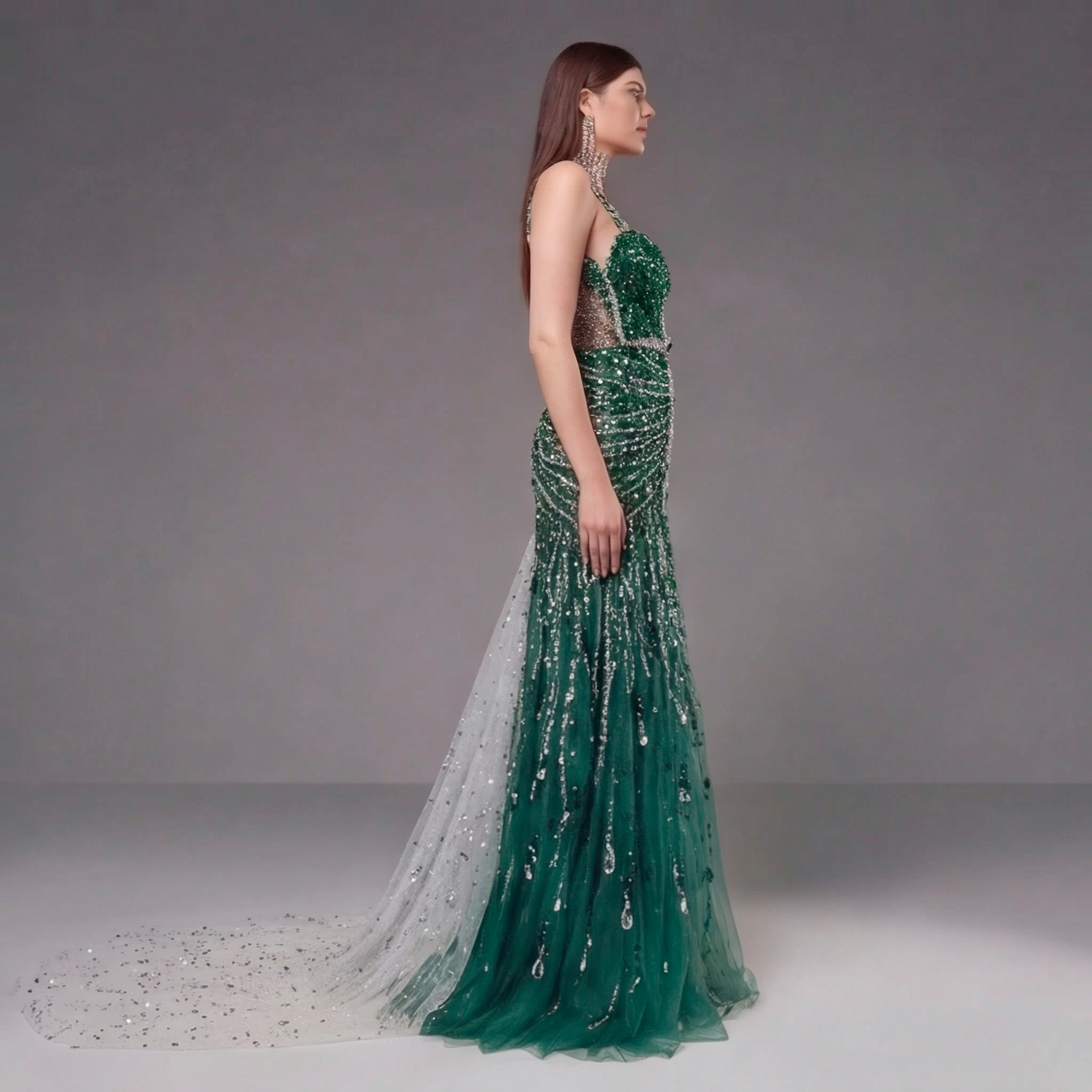 Emerald Green Crystal Embellished Deep V-Neck Mermaid Gown with Architectural Waist Detail and High Slit