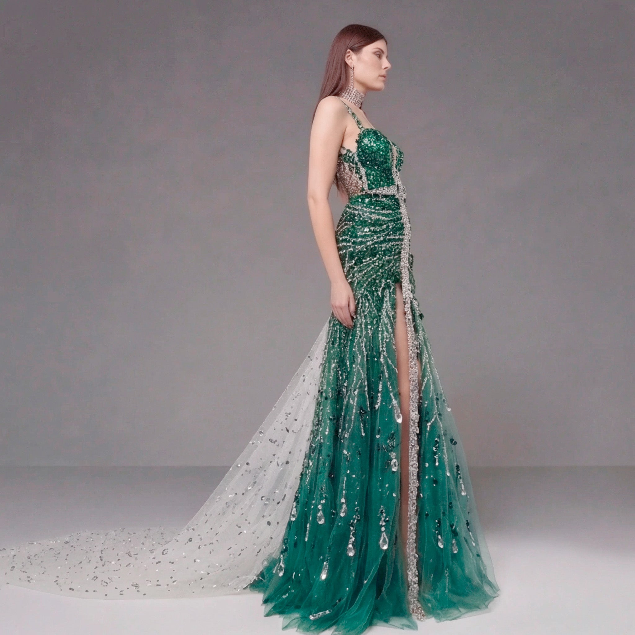 Emerald Green Crystal Embellished Deep V-Neck Mermaid Gown with Architectural Waist Detail and High Slit