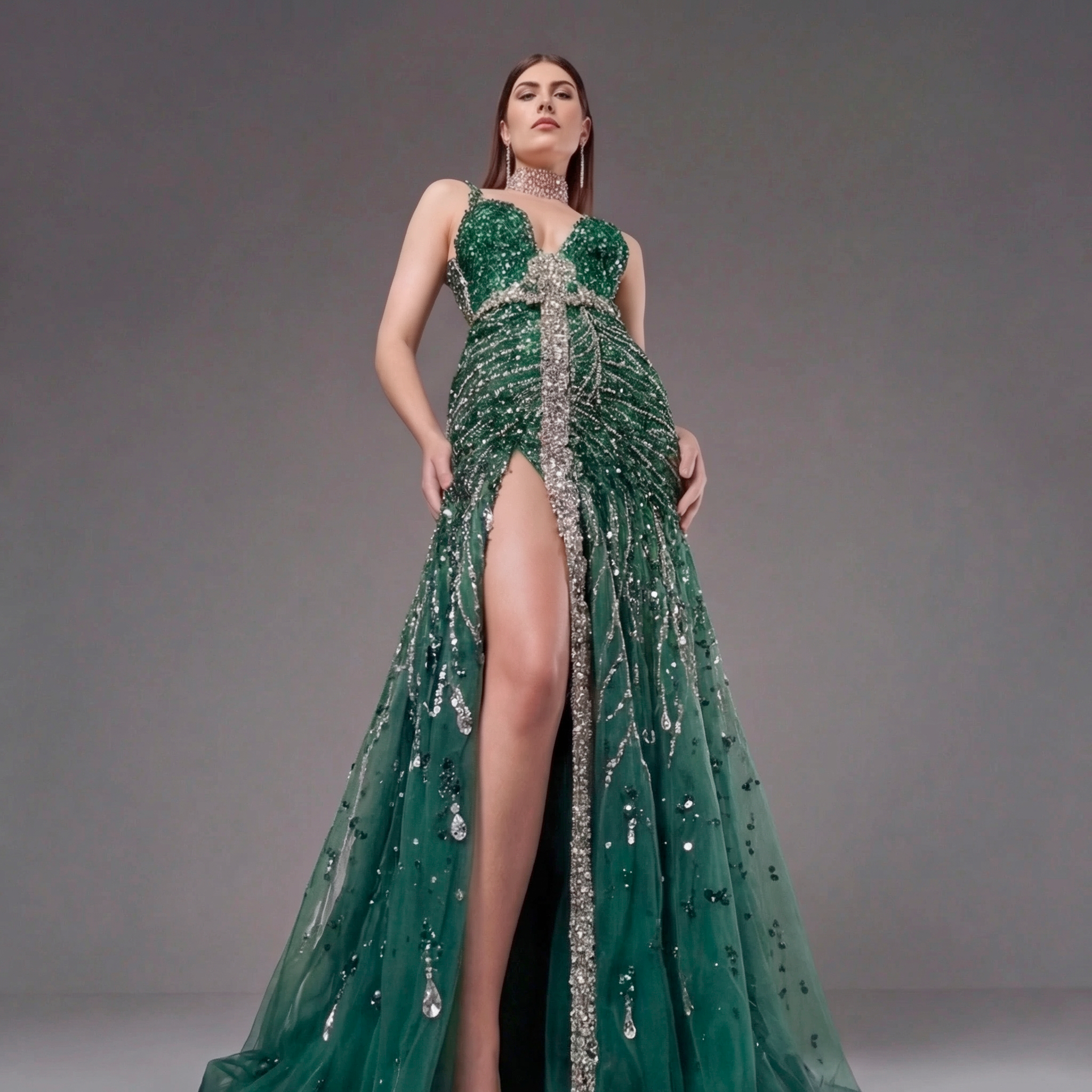 Emerald Green Crystal Embellished Deep V-Neck Mermaid Gown with Architectural Waist Detail and High Slit