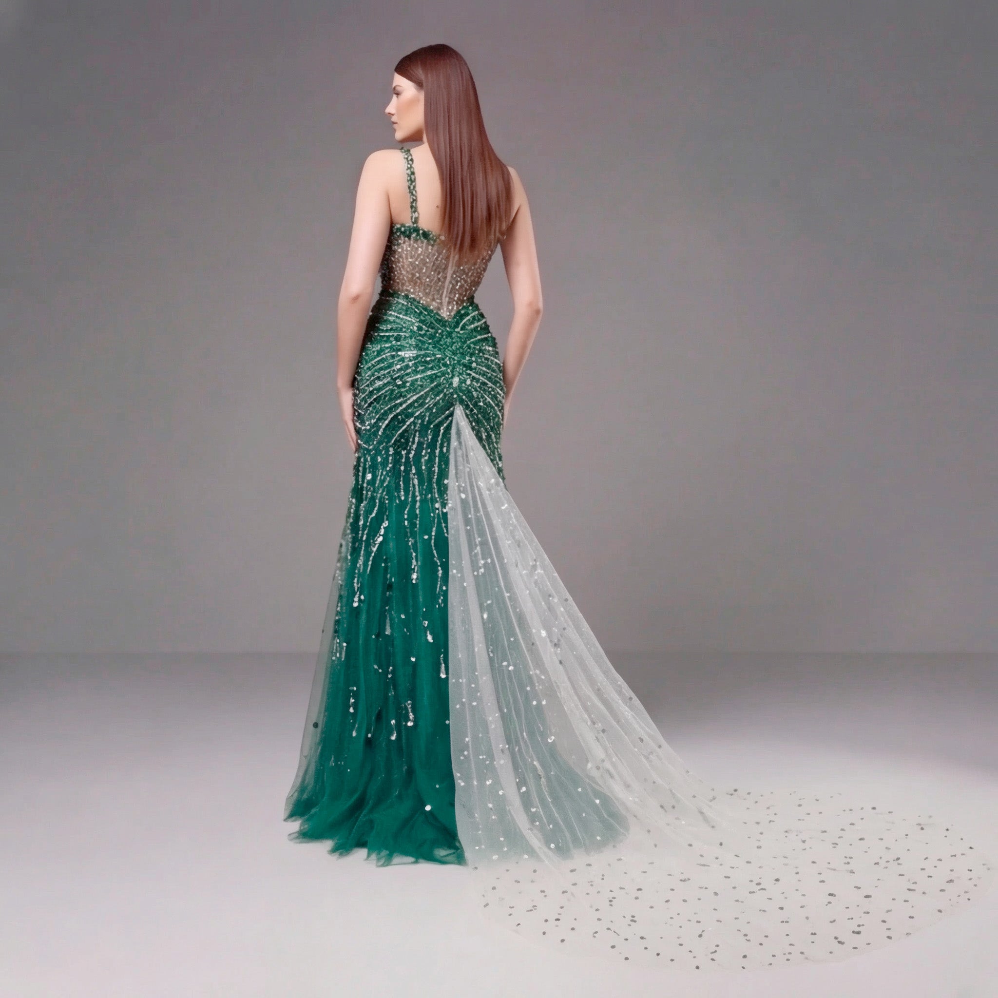 Emerald Green Crystal Embellished Deep V-Neck Mermaid Gown with Architectural Waist Detail and High Slit