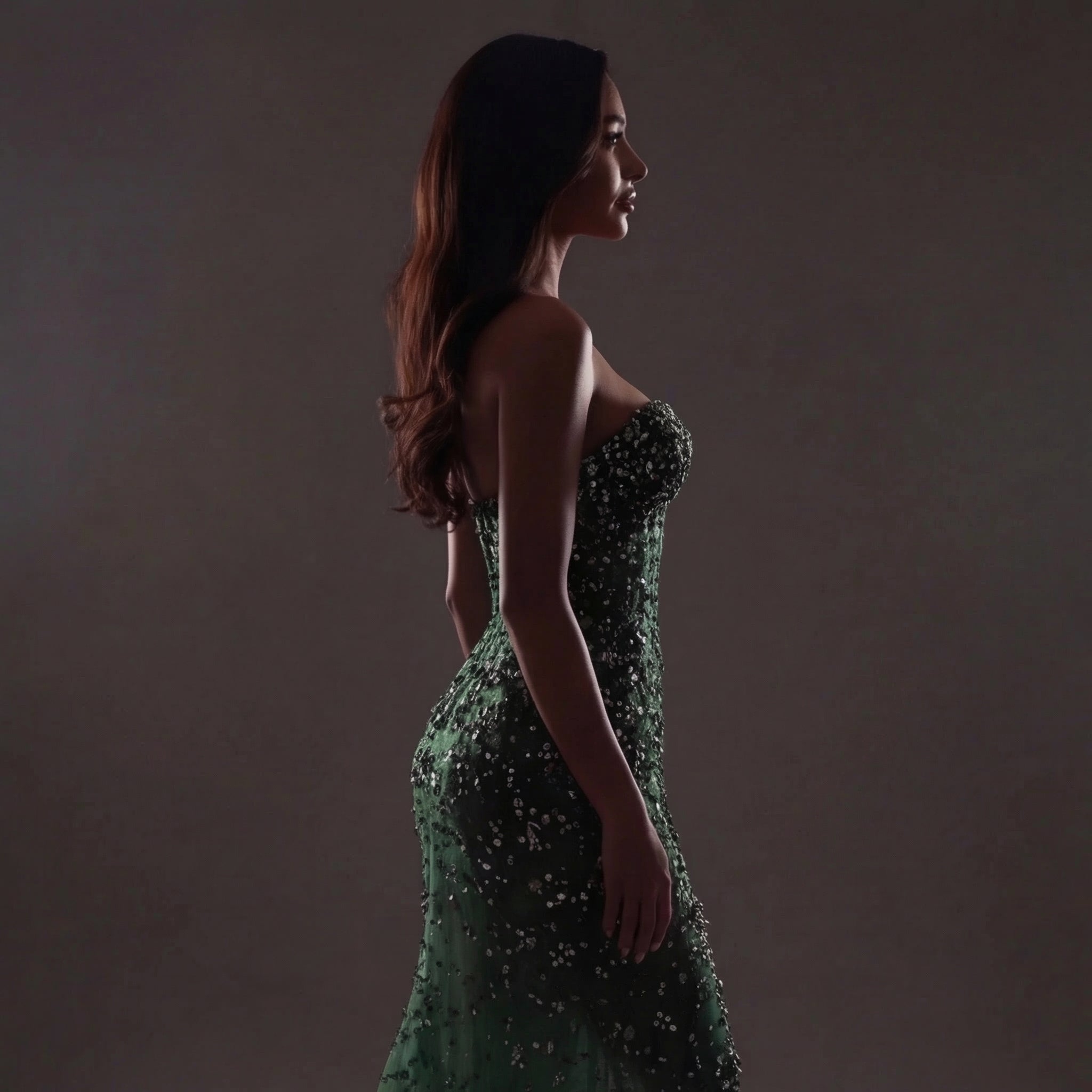 Emerald Green Strapless Corset Mermaid Gown with Crystal Embellishments, Sheer Illusion Fabric, High Slit and Flowing Train
