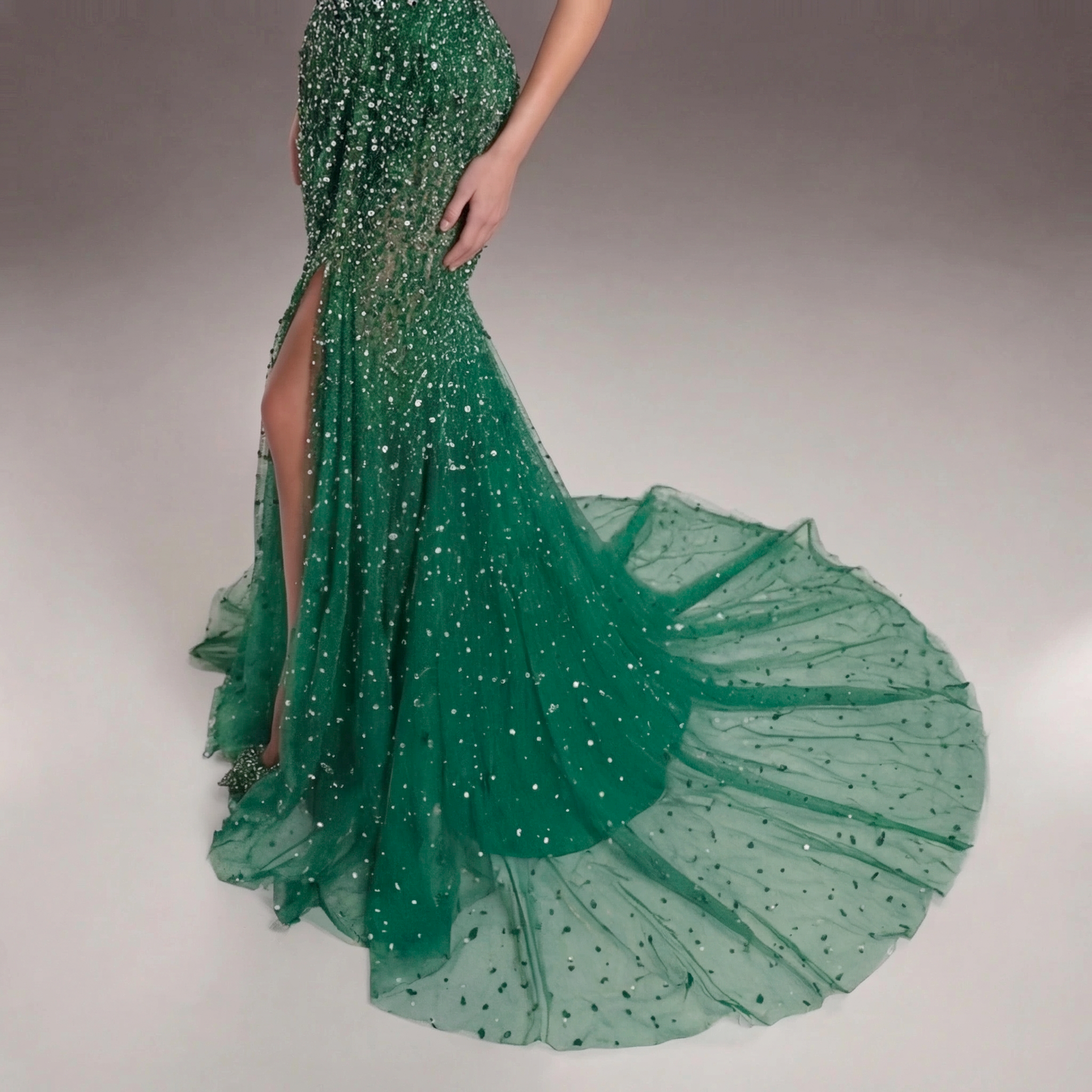 Emerald Green Strapless Mermaid Evening Gown with Crystal Embellishments, Sheer Corset Bodice, High Slit and Tulle Train