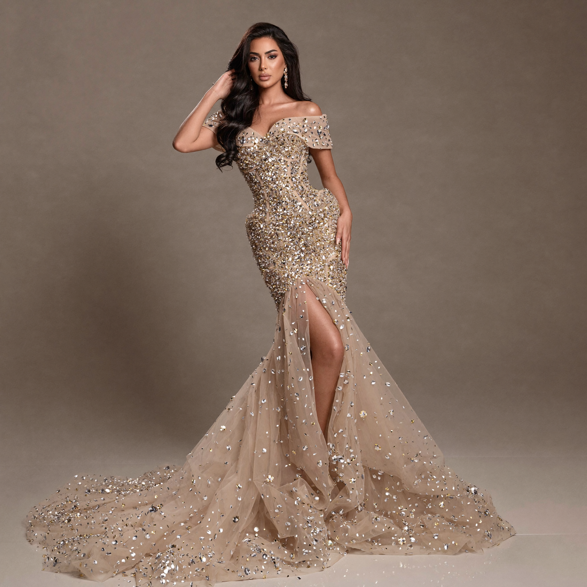 Nude Gold Off-Shoulder Mermaid Gown with Sheer Corset Bodice, Crystal Embellishments, High Slit and Flowing Tulle Train