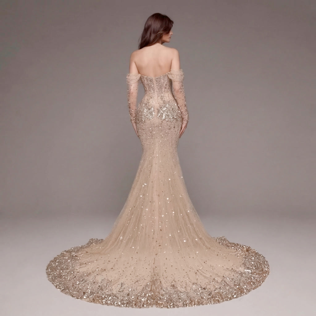 Nude Champagne Off-Shoulder Mermaid Gown with Sheer Corset Bodice, Crystal Embellishments, Long Sleeves and High Slit Train