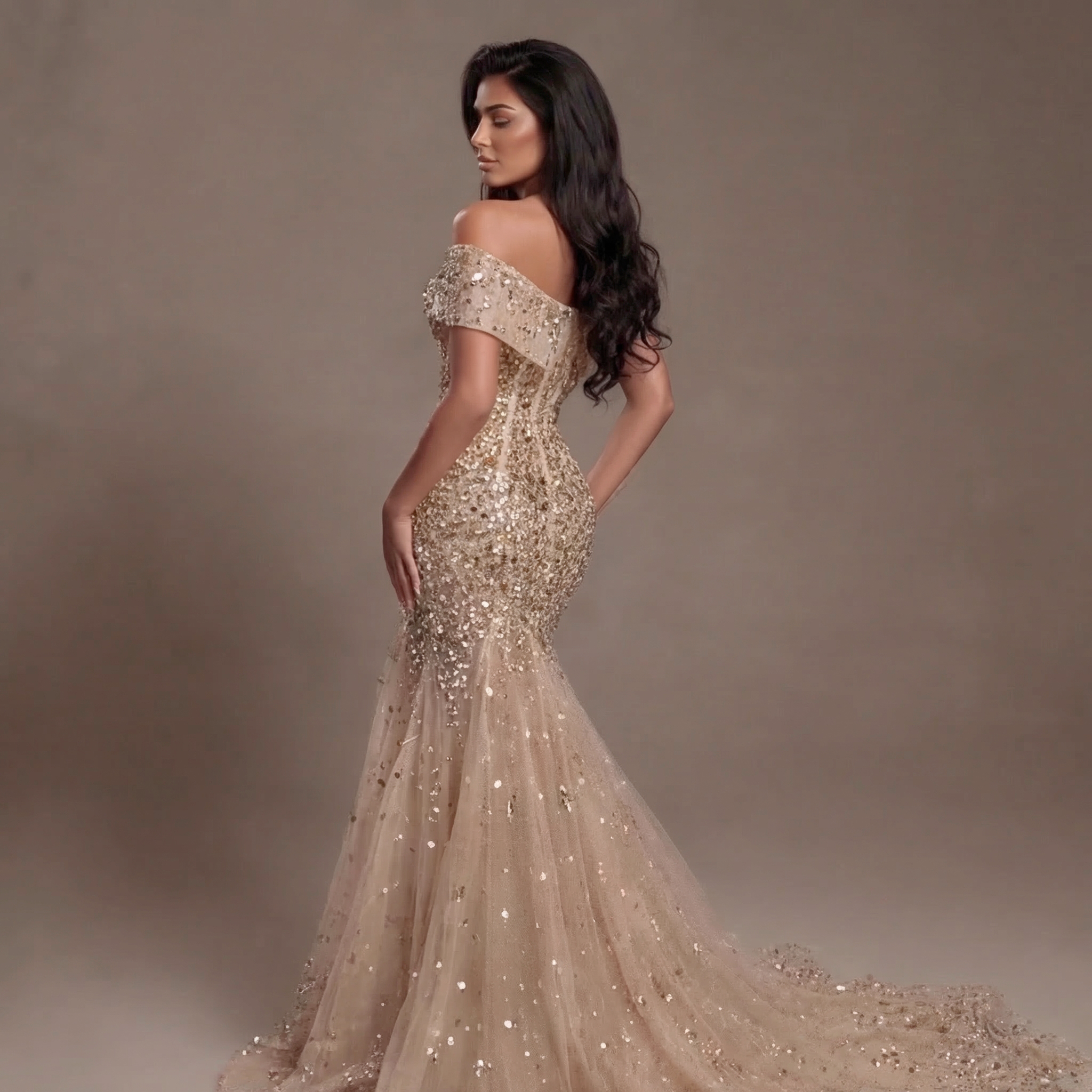 Nude Gold Off-Shoulder Mermaid Gown with Sheer Corset Bodice, Crystal Embellishments, High Slit and Flowing Tulle Train