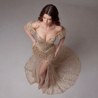Nude Gold Off-Shoulder Mermaid Gown with Sheer Corset Bodice, Crystal Embellishments, High Slit and Glitter Tulle Train