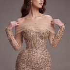 Nude Gold Off-Shoulder Mermaid Gown with Illusion Long Sleeves, Sheer Corset Bodice, Crystal Embellishments and High Slit Train