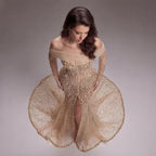 Nude Gold Off-Shoulder Mermaid Gown with Illusion Long Sleeves, Sheer Corset Bodice, Crystal Embellishments and High Slit Train