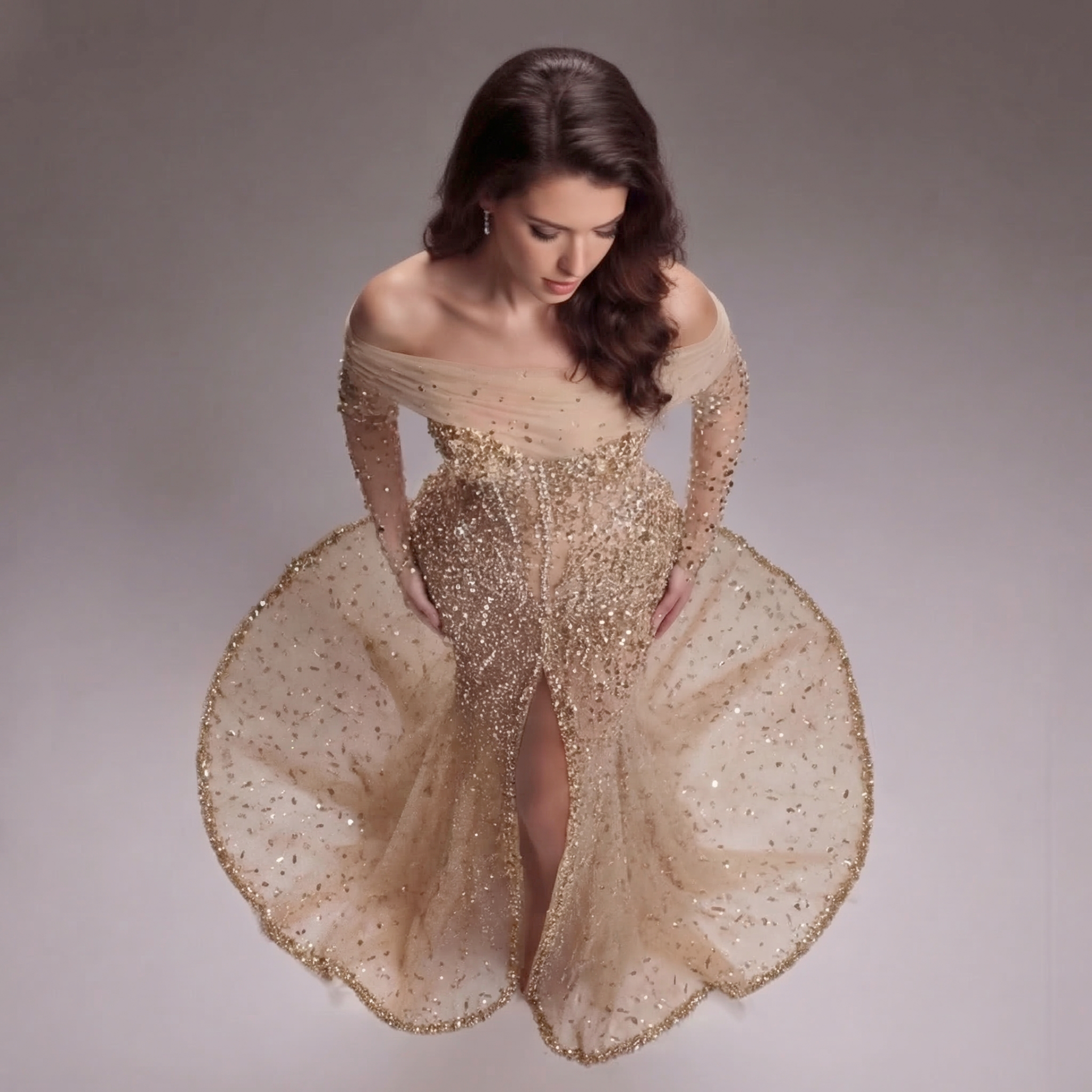 Nude Gold Off-Shoulder Mermaid Gown with Illusion Long Sleeves, Sheer Corset Bodice, Crystal Embellishments and High Slit Train