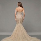 Champagne Off-Shoulder Mermaid Gown with Crystal Embellishments, Sculpted Corset Bodice, High Slit and Soft Tulle Train