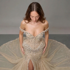 Champagne Off-Shoulder Mermaid Gown with Crystal Embellishments, Sculpted Corset Bodice, High Slit and Soft Tulle Train