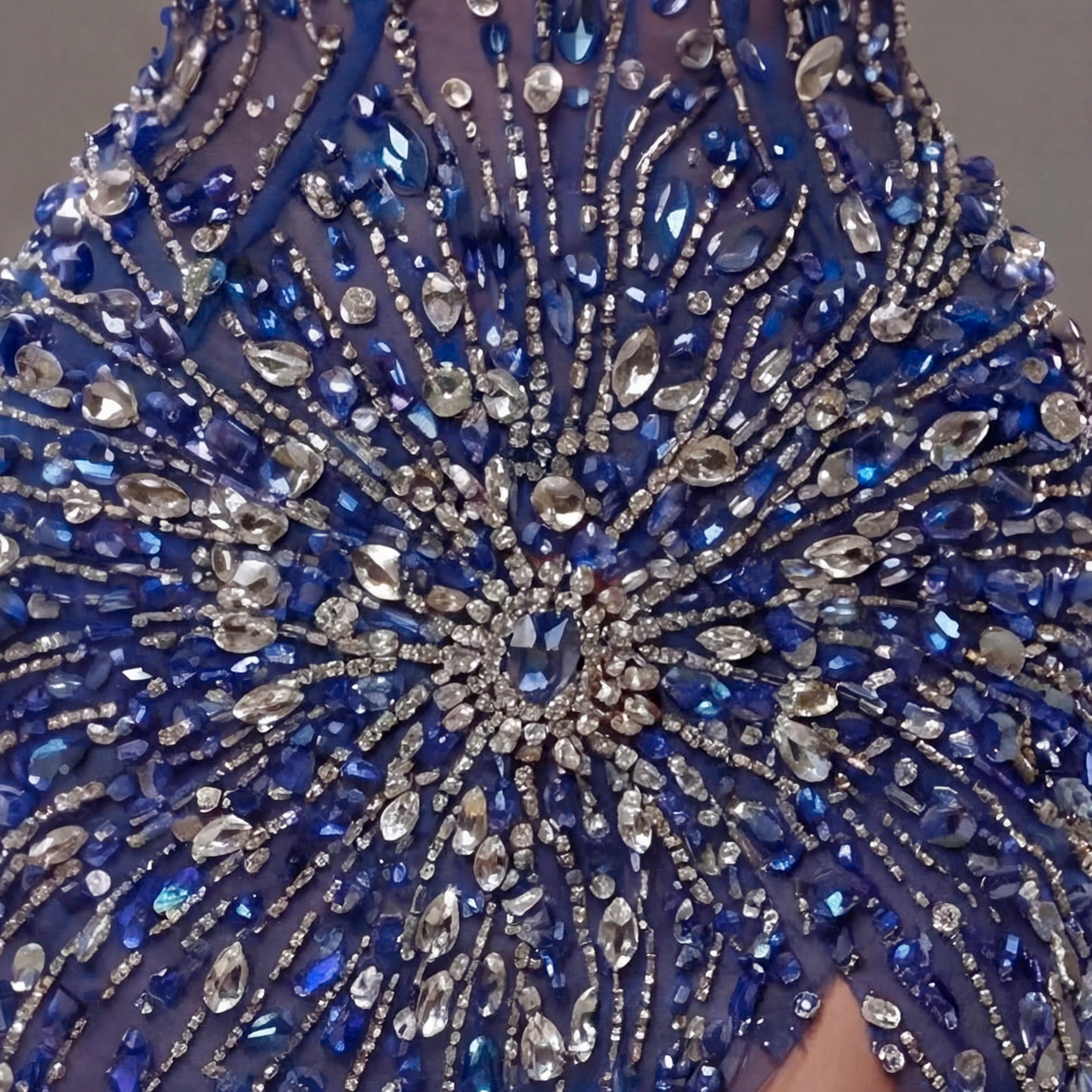 Royal Blue Crystal Embellished Mermaid Gown with Deep V Neckline, Sculpted Corset Fit and High Slit
