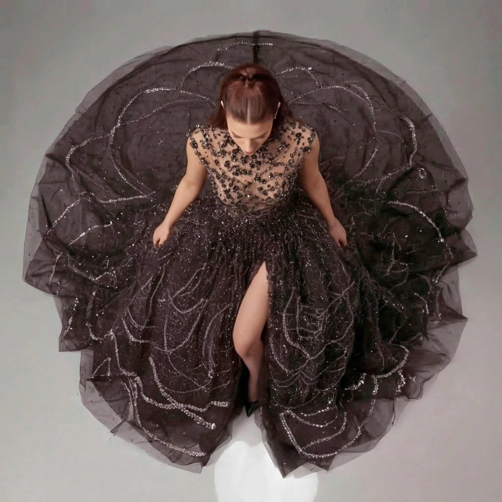 Black High Neck Embellished Ball Gown with Sheer Bodice, Crystal Detailing, Full Skirt and Dramatic Train