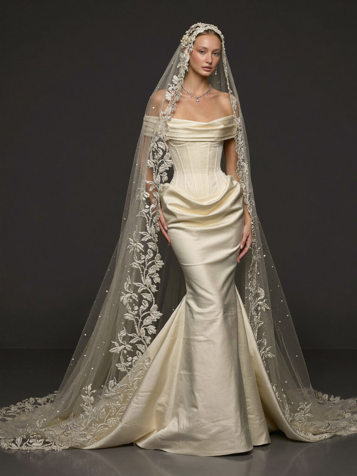 Champagne Ivory Sculpted Satin Mermaid Wedding Gown – Draped Off-Shoulder Neckline, Basque Waist Corset & Pearl Floral Cathedral Veil