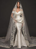 Pearl-Trimmed Satin Mermaid Wedding Dress – Off-Shoulder Draped Corset Gown with Sculpted Hip Detail & Floral Lace Cathedral Veil