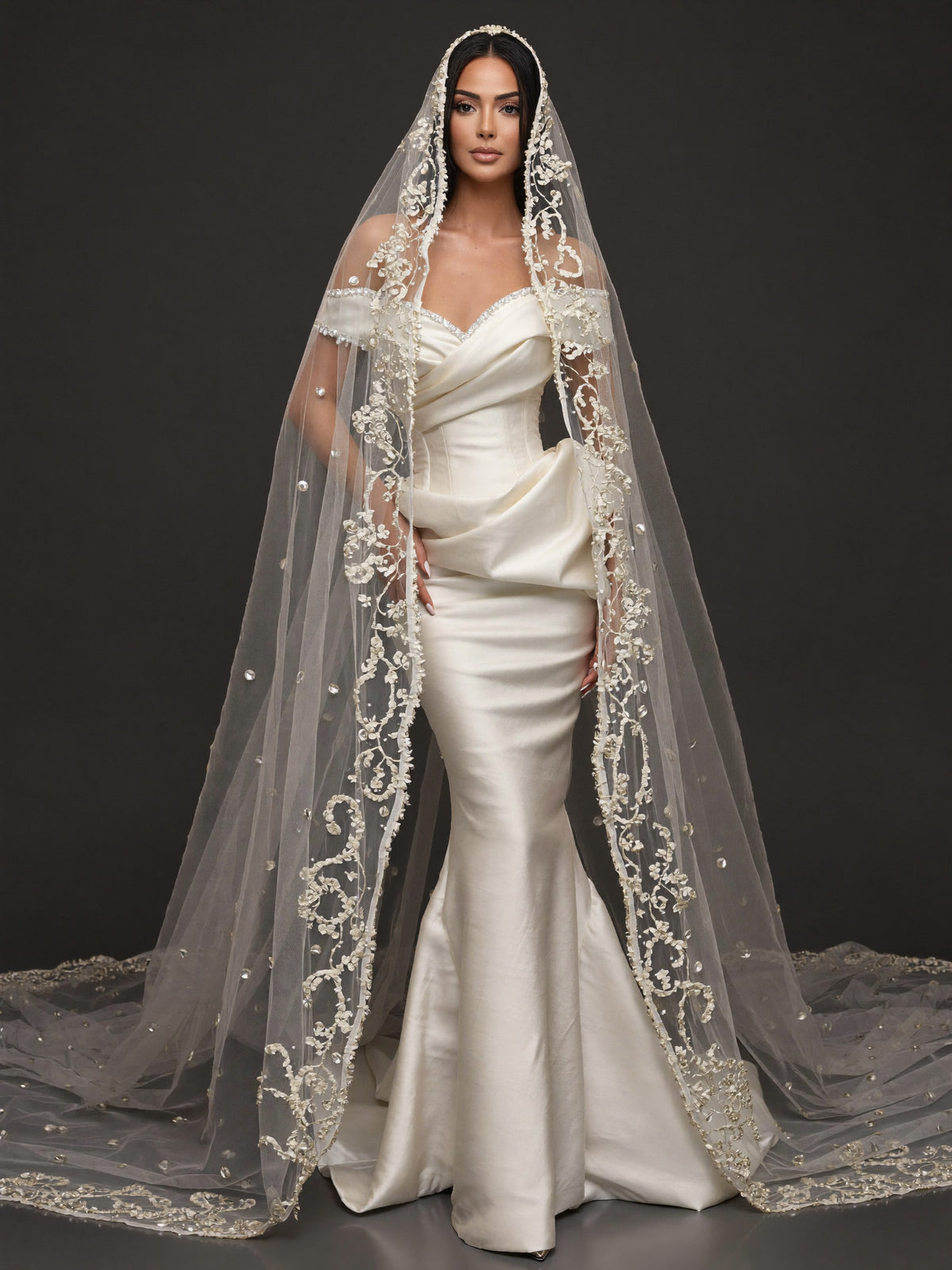 Pearl-Trimmed Satin Mermaid Wedding Dress – Off-Shoulder Draped Corset Gown with Sculpted Hip Detail & Floral Lace Cathedral Veil
