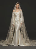 Champagne White Satin Off-Shoulder Mermaid Wedding Dress – Asymmetric Draped Bodice, Long Sleeves & Floral Embroidered Cathedral Veil