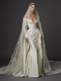 Pearl White Satin Corset Wedding Gown – Plunging Sweetheart Neckline, Draped Overskirt, Long Sleeves & Embroidered Cathedral Veil