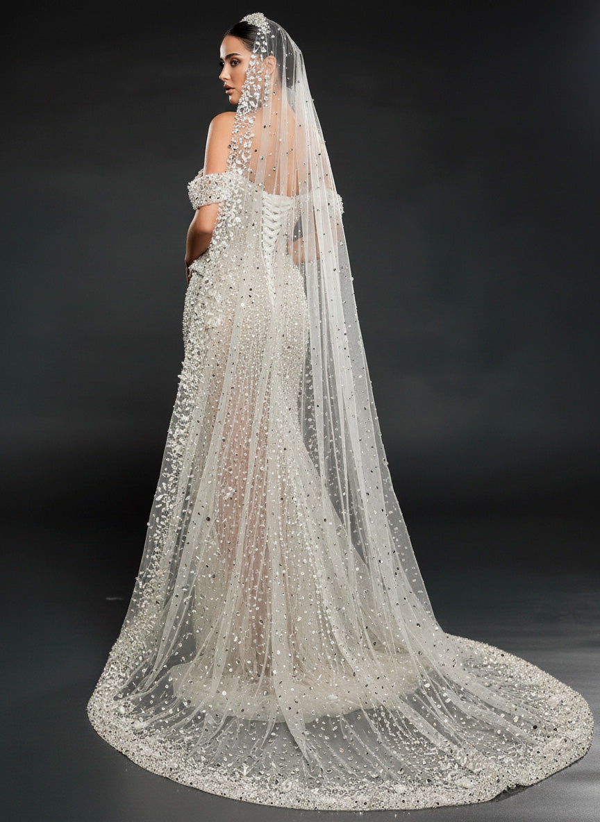 Ivory Crystal Embellished Sheer Bridal Gown – Off-Shoulder Corset Wedding Dress with Cathedral Veil