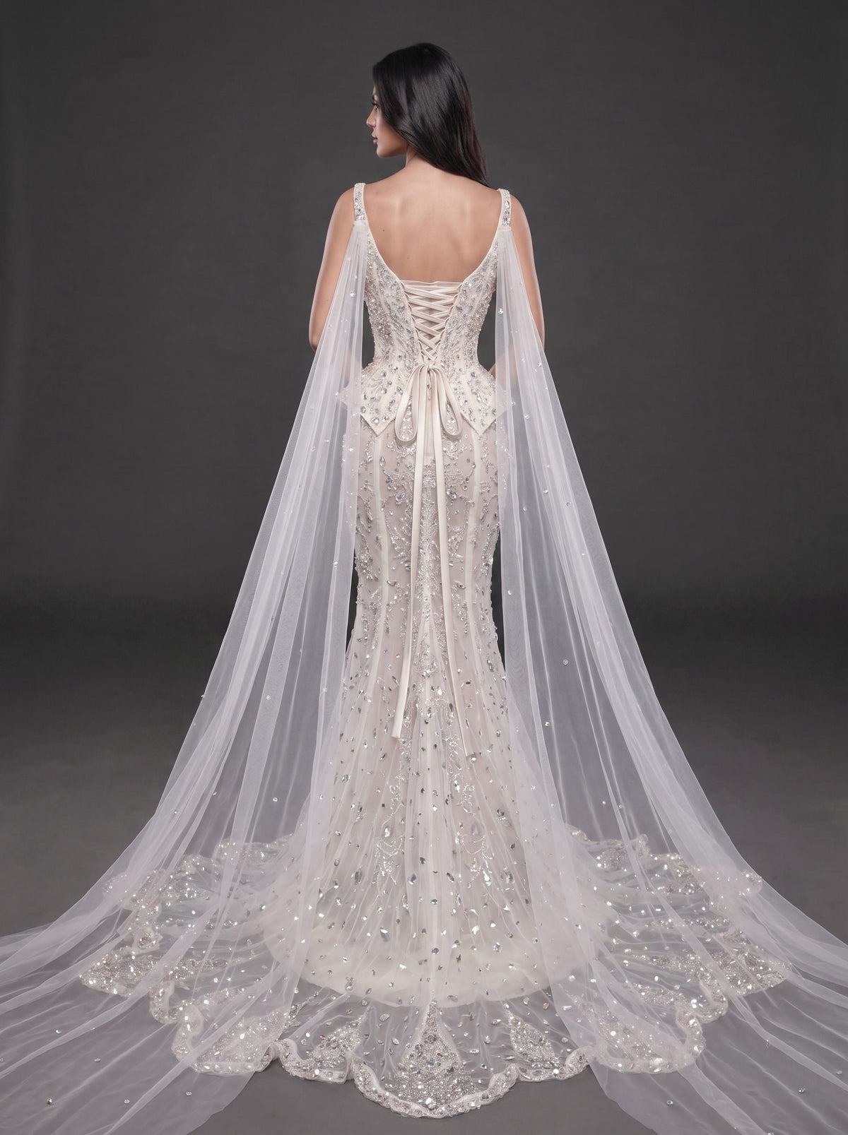 Ivory Crystal Embellished Corset Wedding Gown – Fitted Bridal Dress with Draped Tulle Cape & Train