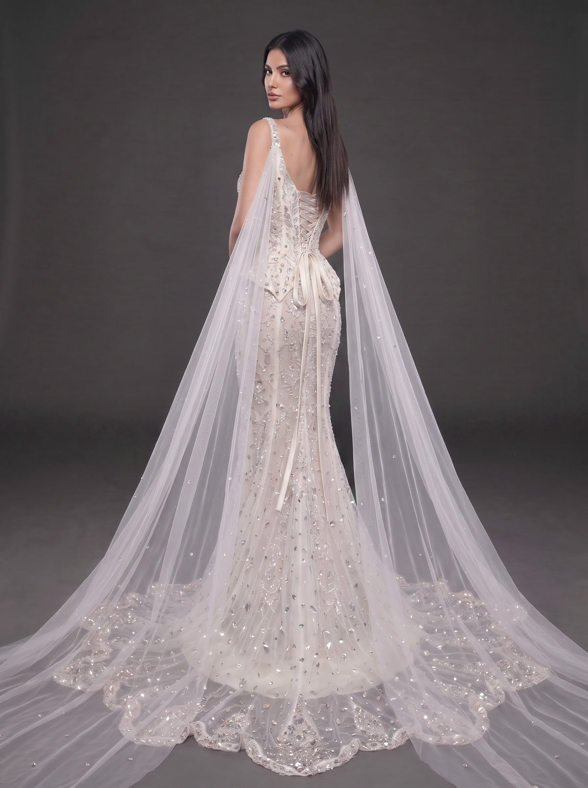 Ivory Crystal Embellished Corset Wedding Gown – Fitted Bridal Dress with Draped Tulle Cape & Train