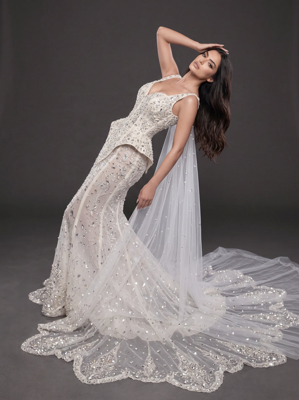 Ivory Crystal Embellished Corset Wedding Gown – Fitted Bridal Dress with Draped Tulle Cape & Train