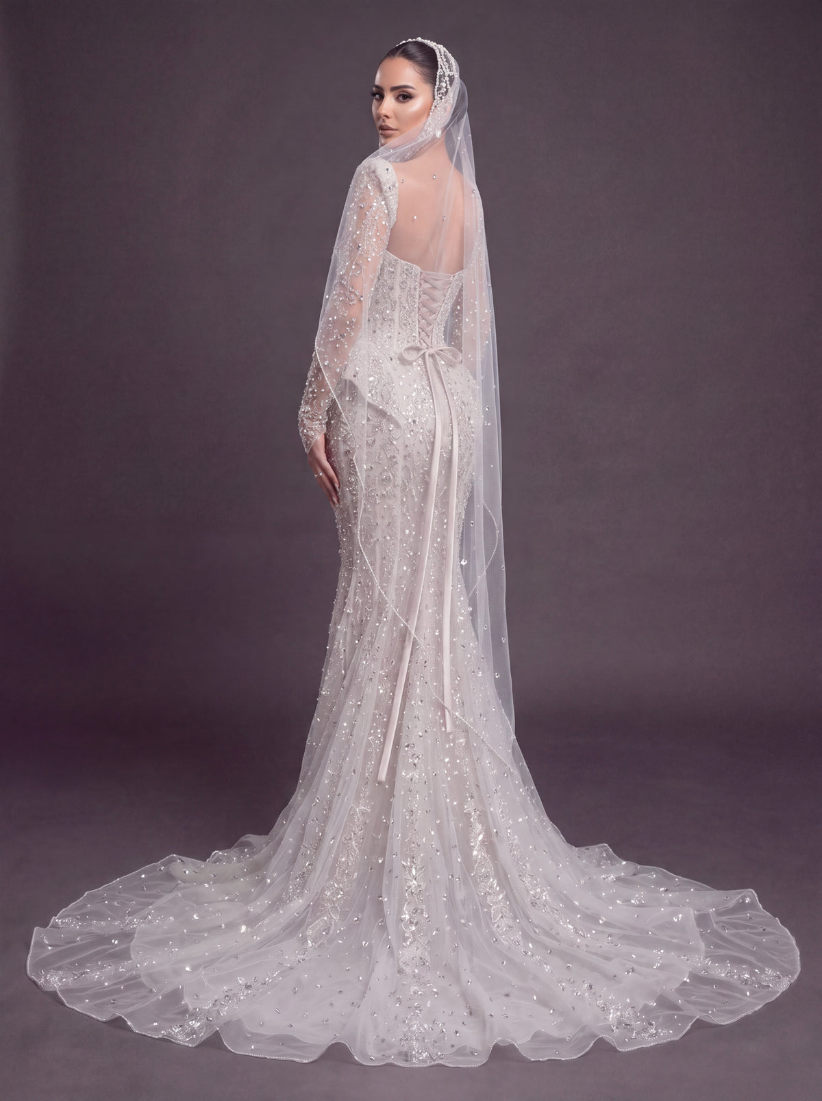 Long Sleeve Corset Bridal Dress with Sculpted Hips & Cathedral Veil – Ivory Crystal Embellished Mermaid Wedding Gown