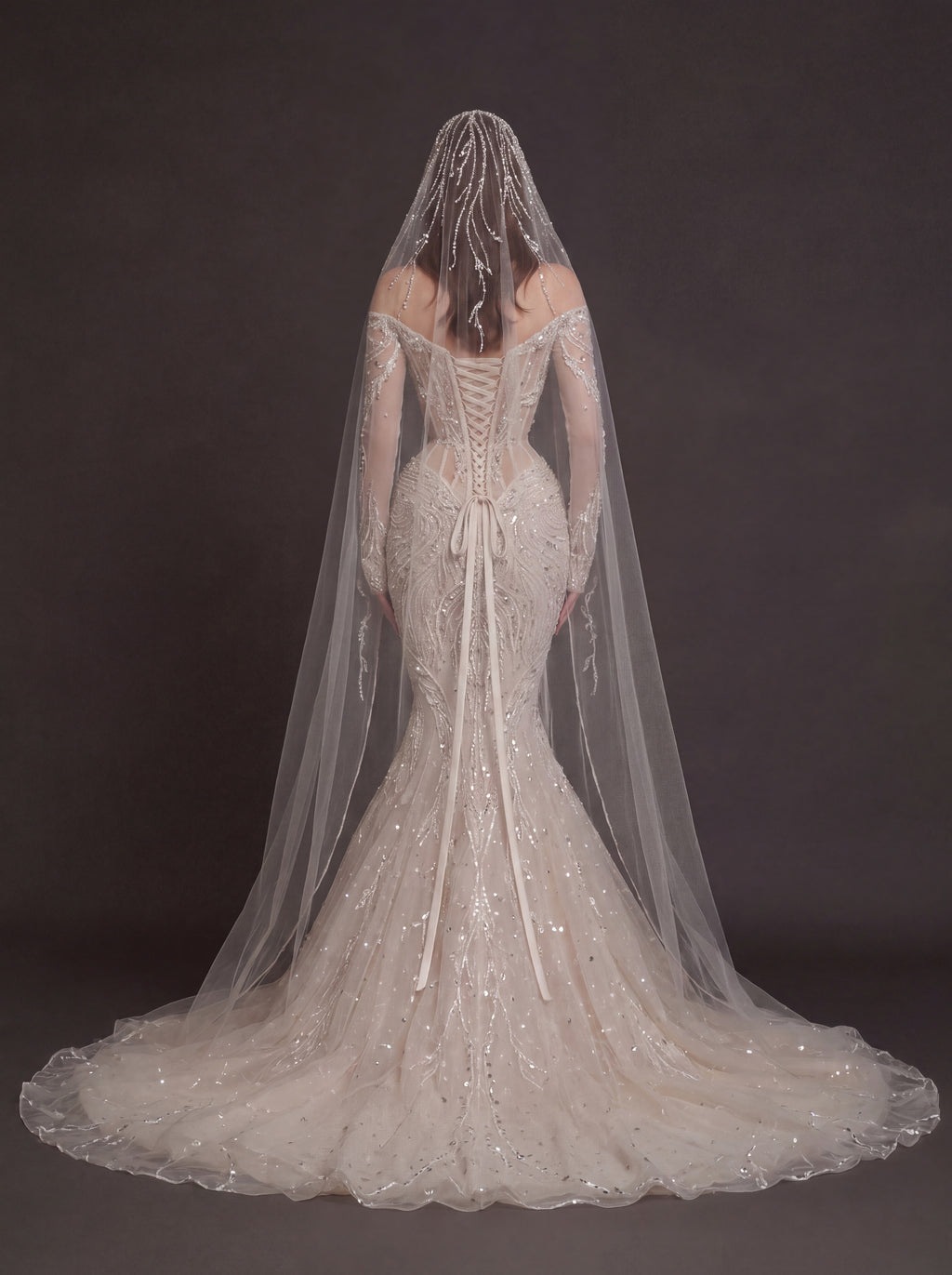 Nude Illusion Corset Mermaid Wedding Dress – Off-Shoulder Crystal Embroidered Bridal Gown with Sheer Long Sleeves and Cathedral Veil