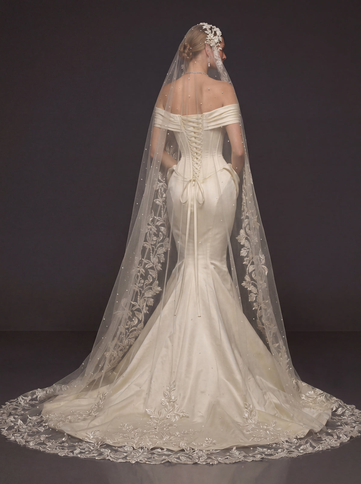 Champagne Ivory Sculpted Satin Mermaid Wedding Gown – Draped Off-Shoulder Neckline, Basque Waist Corset & Pearl Floral Cathedral Veil