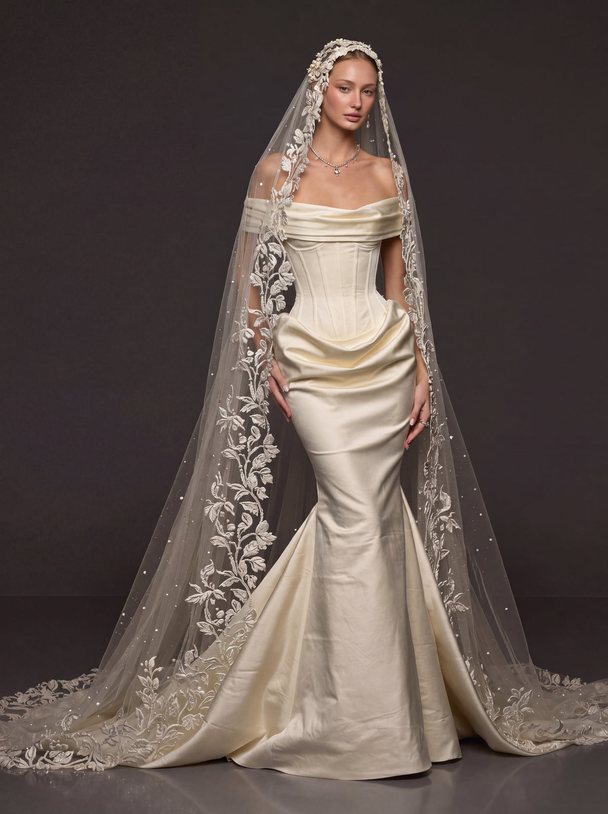 Champagne Ivory Sculpted Satin Mermaid Wedding Gown – Draped Off-Shoulder Neckline, Basque Waist Corset & Pearl Floral Cathedral Veil