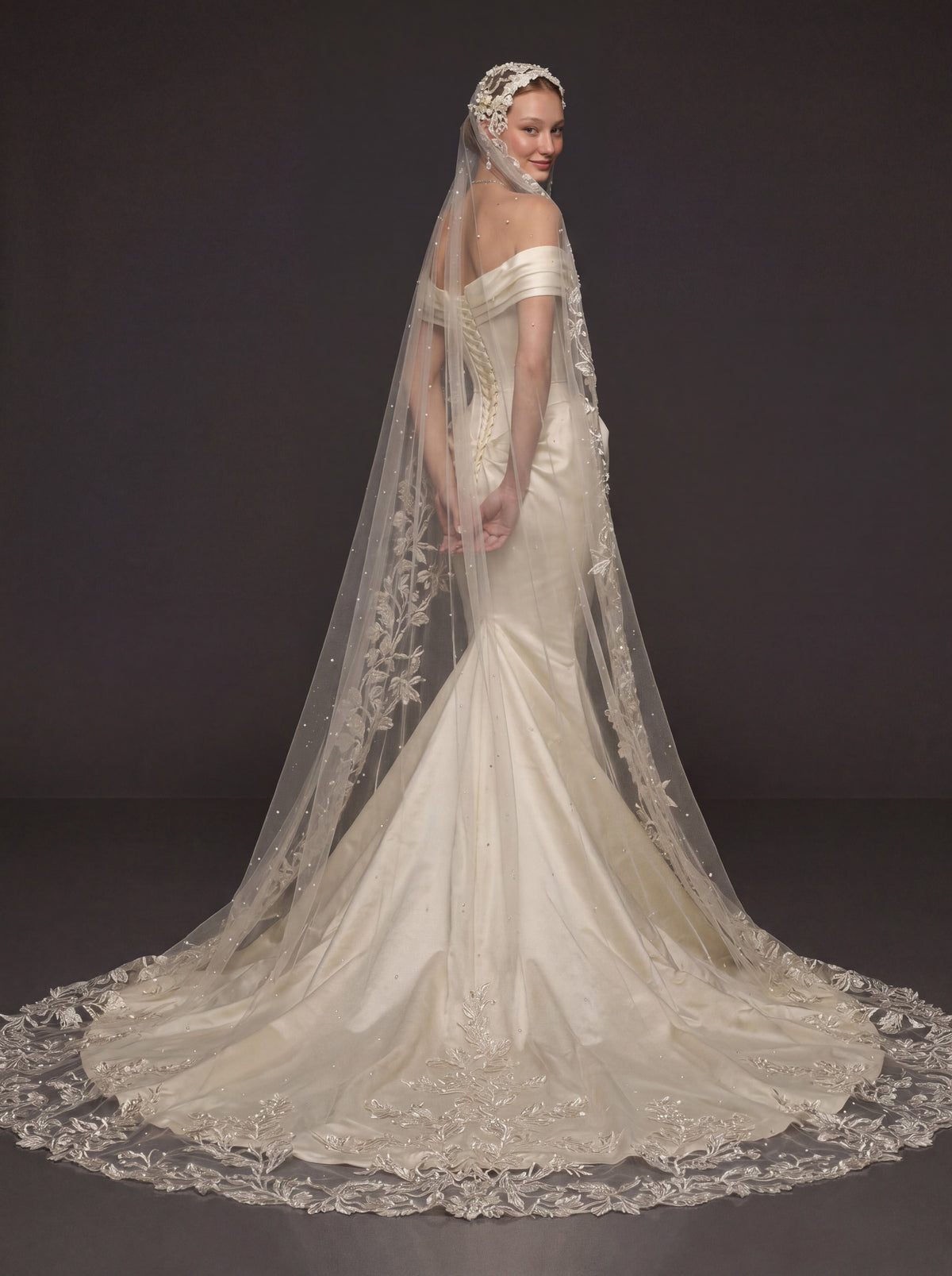 Champagne Ivory Sculpted Satin Mermaid Wedding Gown – Draped Off-Shoulder Neckline, Basque Waist Corset & Pearl Floral Cathedral Veil