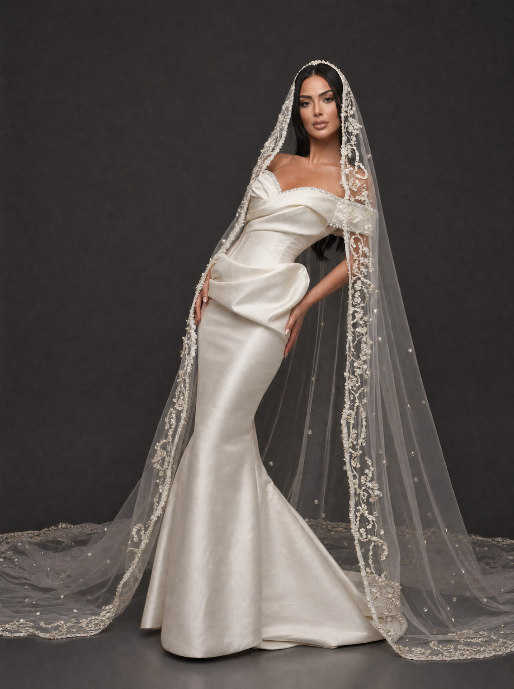 Pearl-Trimmed Satin Mermaid Wedding Dress – Off-Shoulder Draped Corset Gown with Sculpted Hip Detail & Floral Lace Cathedral Veil