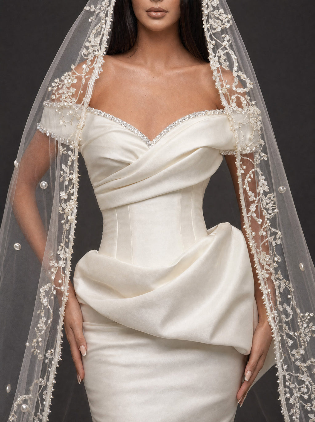 Pearl-Trimmed Satin Mermaid Wedding Dress – Off-Shoulder Draped Corset Gown with Sculpted Hip Detail & Floral Lace Cathedral Veil