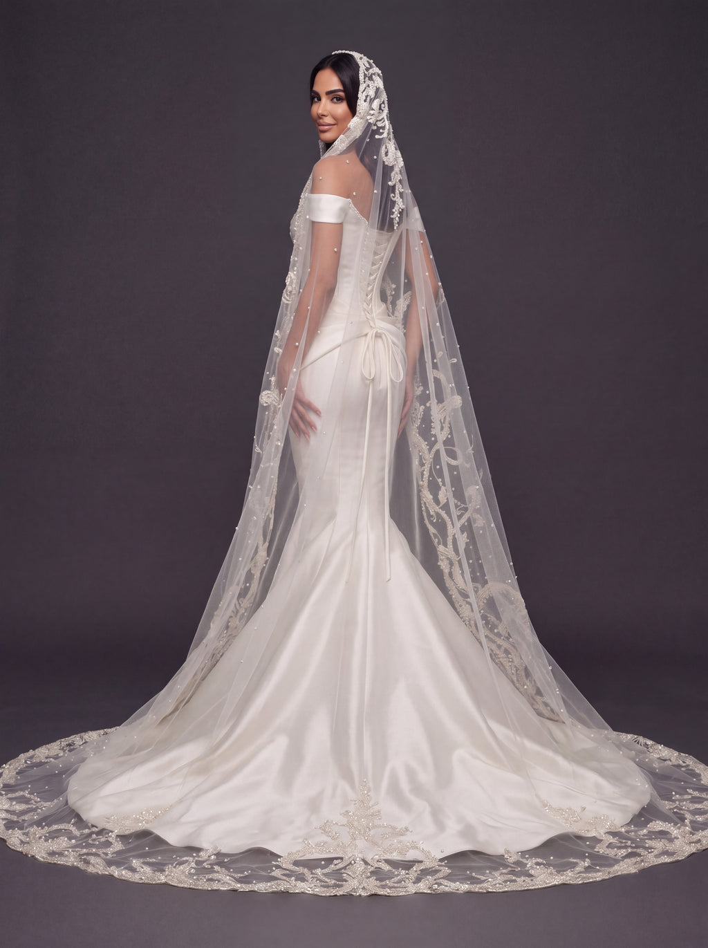 Sculpted Ivory Satin Mermaid Wedding Gown – Plunging Sweetheart Corset with Draped Waist & Embroidered Cathedral Veil