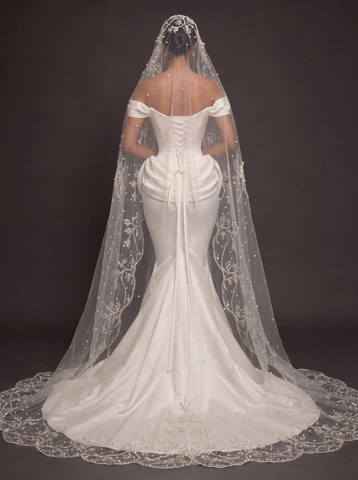 Pearl Button Ivory Satin Mermaid Wedding Gown – Off-Shoulder Sweetheart Corset with Draped Hips & Embroidered Cathedral Veil