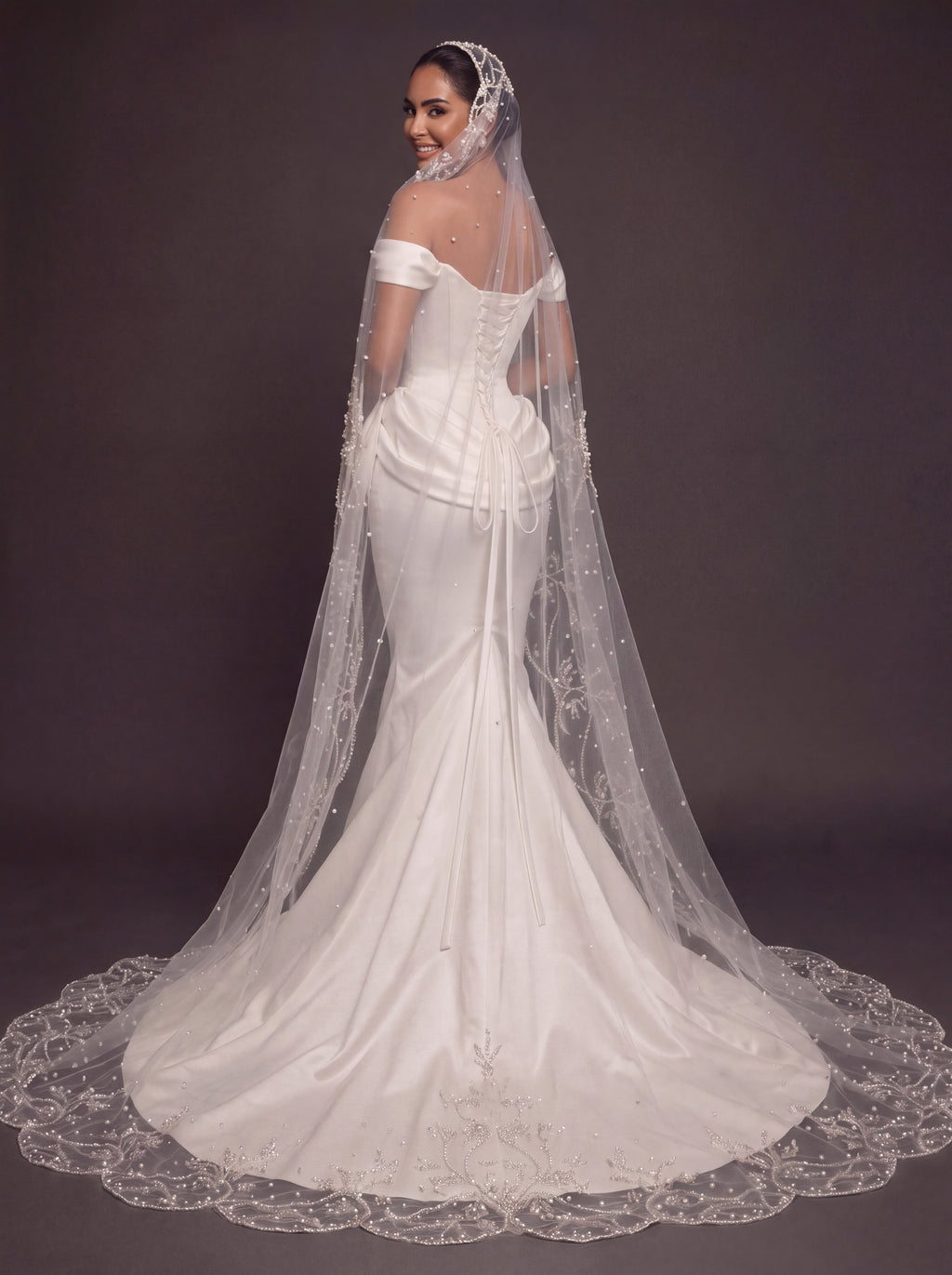 Pearl Button Ivory Satin Mermaid Wedding Gown – Off-Shoulder Sweetheart Corset with Draped Hips & Embroidered Cathedral Veil
