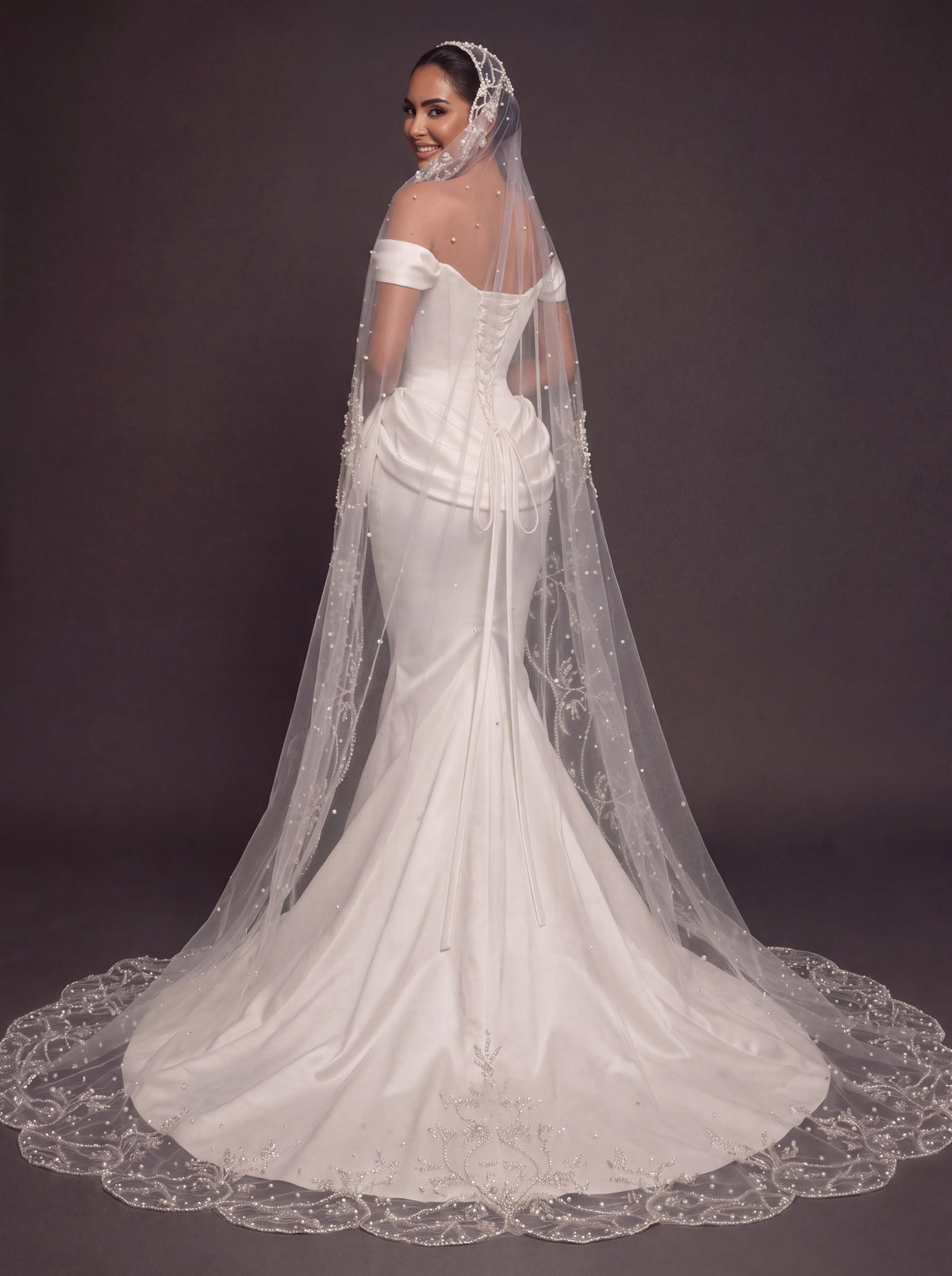 Pearl Button Ivory Satin Mermaid Wedding Gown – Off-Shoulder Sweetheart Corset with Draped Hips & Embroidered Cathedral Veil