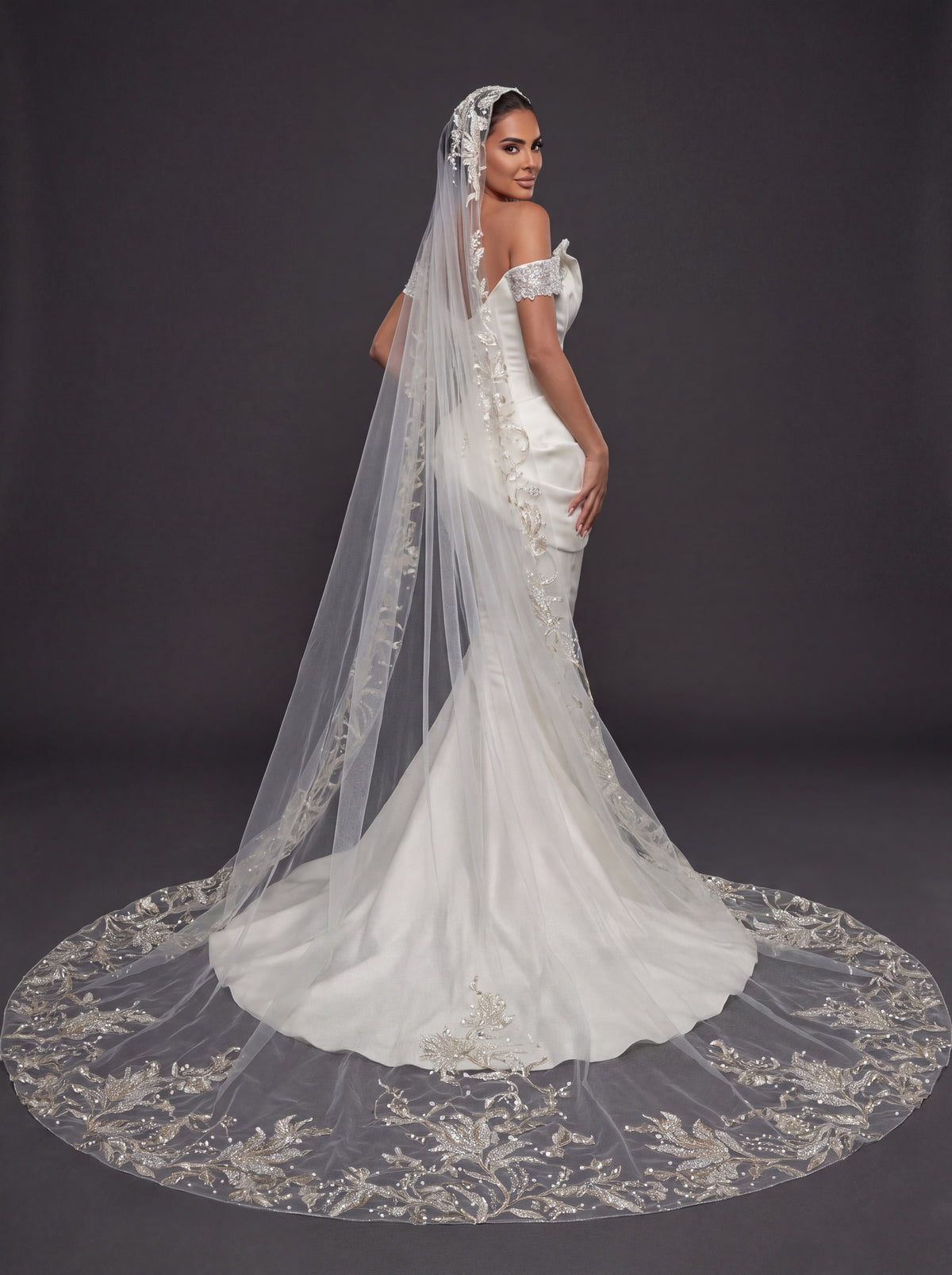 Ivory Satin Sculpted Corset Wedding Gown – Deep V-Neckline, Off-Shoulder Sleeves, Draped Mermaid Skirt & Floral Embroidered Cathedral Veil