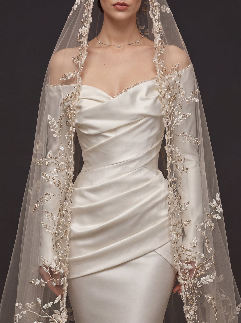 Champagne White Satin Off-Shoulder Mermaid Wedding Dress – Asymmetric Draped Bodice, Long Sleeves & Floral Embroidered Cathedral Veil