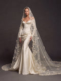 Champagne Pearl Satin Bridal Gown – Sweetheart Corset Bodice, Long Sleeves, Draped Mermaid Skirt & Floral Cathedral Veil