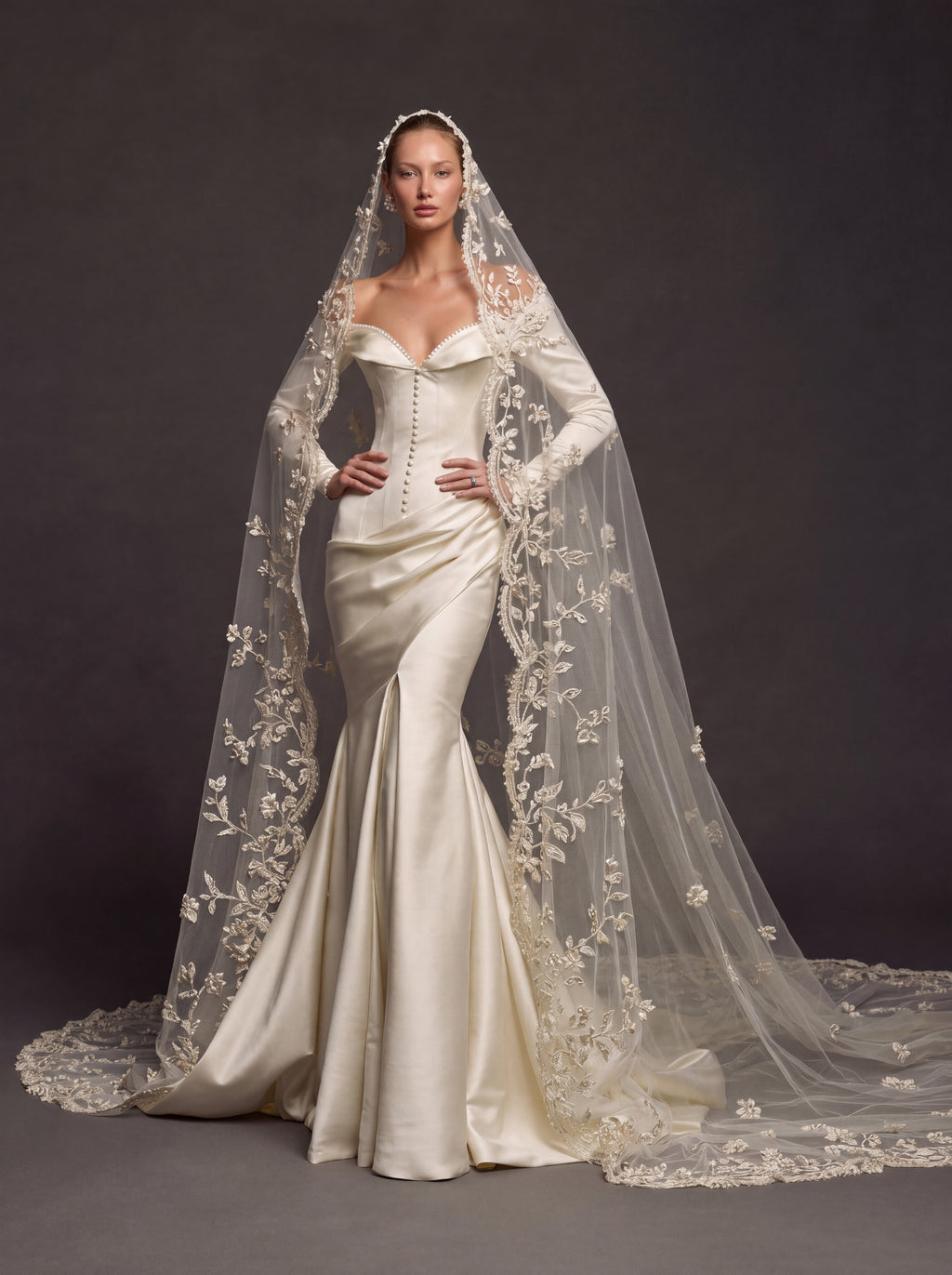 Champagne Pearl Satin Bridal Gown – Sweetheart Corset Bodice, Long Sleeves, Draped Mermaid Skirt & Floral Cathedral Veil