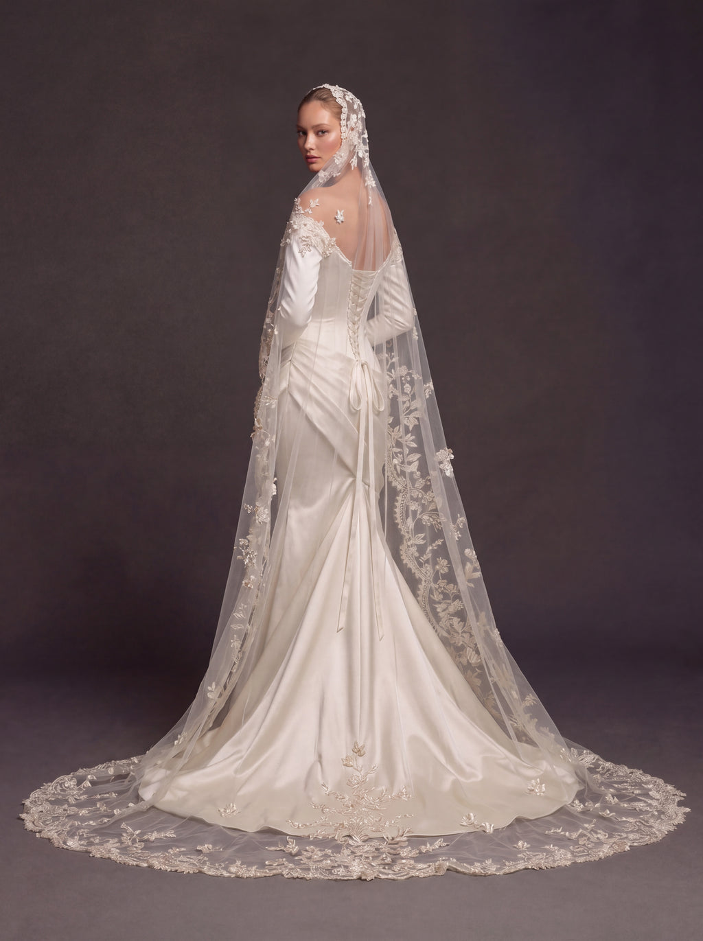 Champagne Pearl Satin Bridal Gown – Sweetheart Corset Bodice, Long Sleeves, Draped Mermaid Skirt & Floral Cathedral Veil